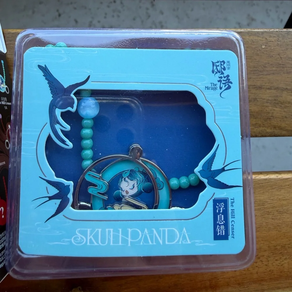 Scullpanda phone wristlet